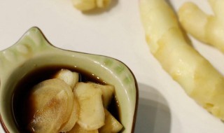 米醋泡生姜有什么功效 小米醋泡生姜的功效