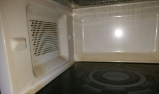 如何清洗微波炉油渍（微波炉油渍怎么清洗）